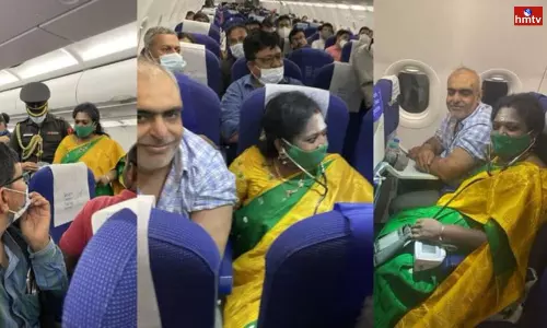 Telangana Governor Treats a Patient on Board a Flight Telangana Governor Treats a Patient on Board a Flight