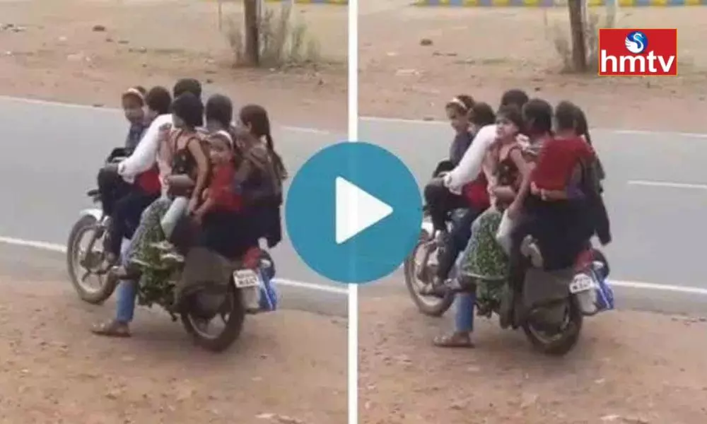 Family of 7 Spotted Riding On A Single Bike
