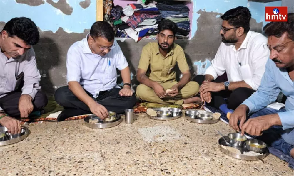 Kejriwal Eats Dinner at auto Driver House At Ahmedabad