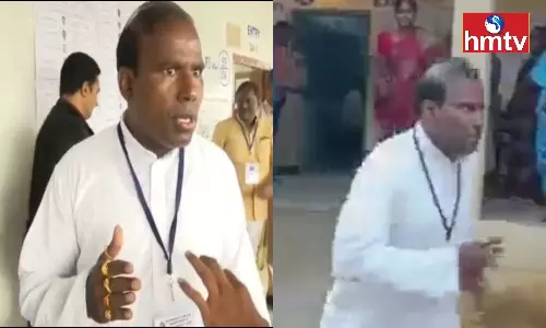 KA Paul Running Out From Polling Station Archives