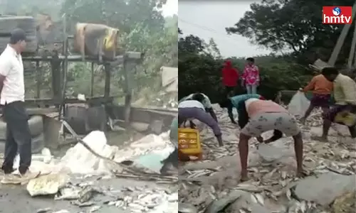 A Fish Lorry overturned at Darbhagudem in Eluru A Fish Lorry overturned at Darbhagudem in Eluru