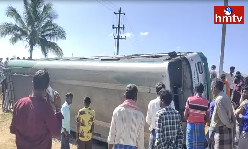 The RTC Bus Overturned after Avoiding the Bike The RTC Bus Overturned after Avoiding the Bike