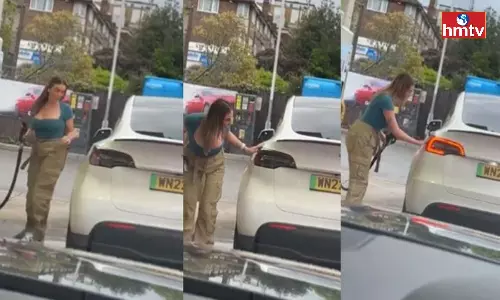 Viral Video Woman Attempt to Fuel up Tesla Car With Petrol Viral Video Woman Attempt to Fuel up Tesla Car With Petrol