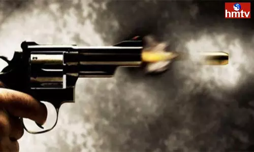 Gun Firing  Again in America