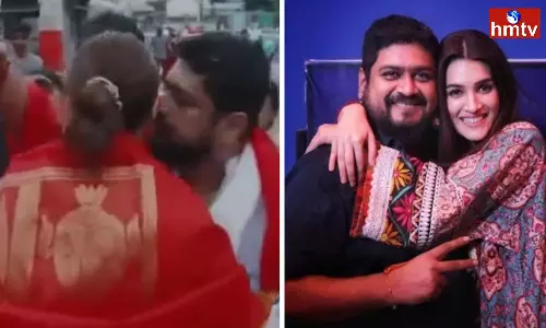 Adipurush Om Raut Kisses Kriti Sanon in Tirumala temple