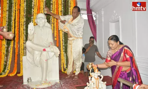 Minister Malla Reddy Who Visited Sai Baba Temple In Bowenpally