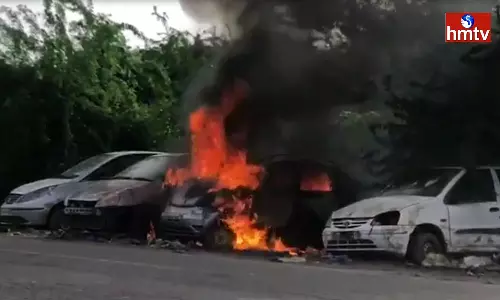 Cars parked on the side of the Road caught fire in Annamayya district Cars parked on the side of the Road caught fire in Annamayya district
