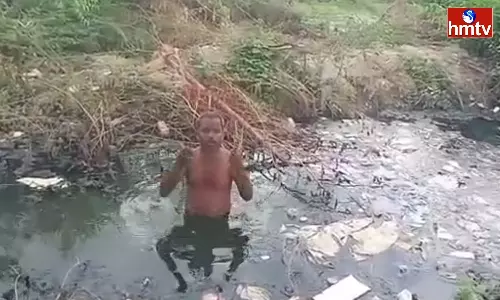 Sub-Sarpanch in Drainage water At Chittoor Sub-Sarpanch in Drainage water At Chittoor