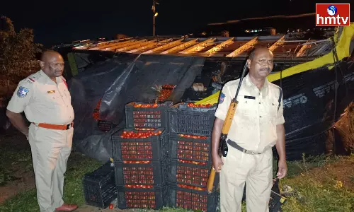 A Tomato Lorry Overturned On The National Highway