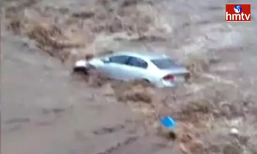 Cars Swept Away In Flooded Gujarat City