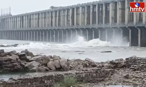 Officials Lifted Two Gates Of Jurala Project Officials Lifted Two Gates Of Jurala Project