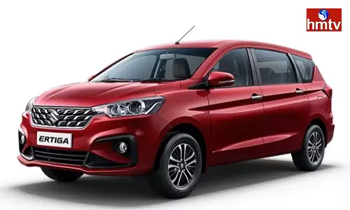 Maruti Ertiga offers 26km Mileage check Price and features in Telugu Maruti Ertiga offers 26km Mileage check Price and features in Telugu