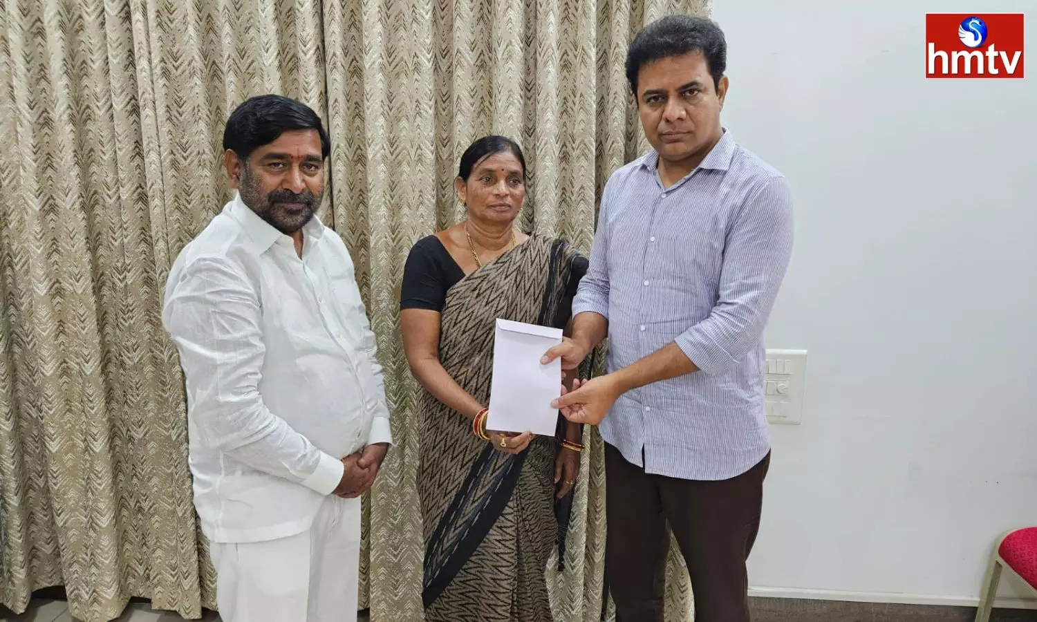 Shankaramma Gives one lakh Check to KTR for Elections Funds
