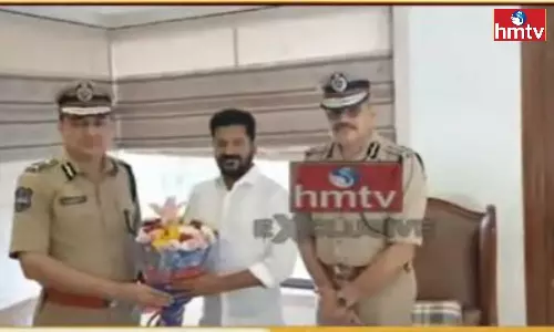 DGP Anjani Kumar Meets Revanth Reddy DGP Anjani Kumar Meets Revanth Reddy