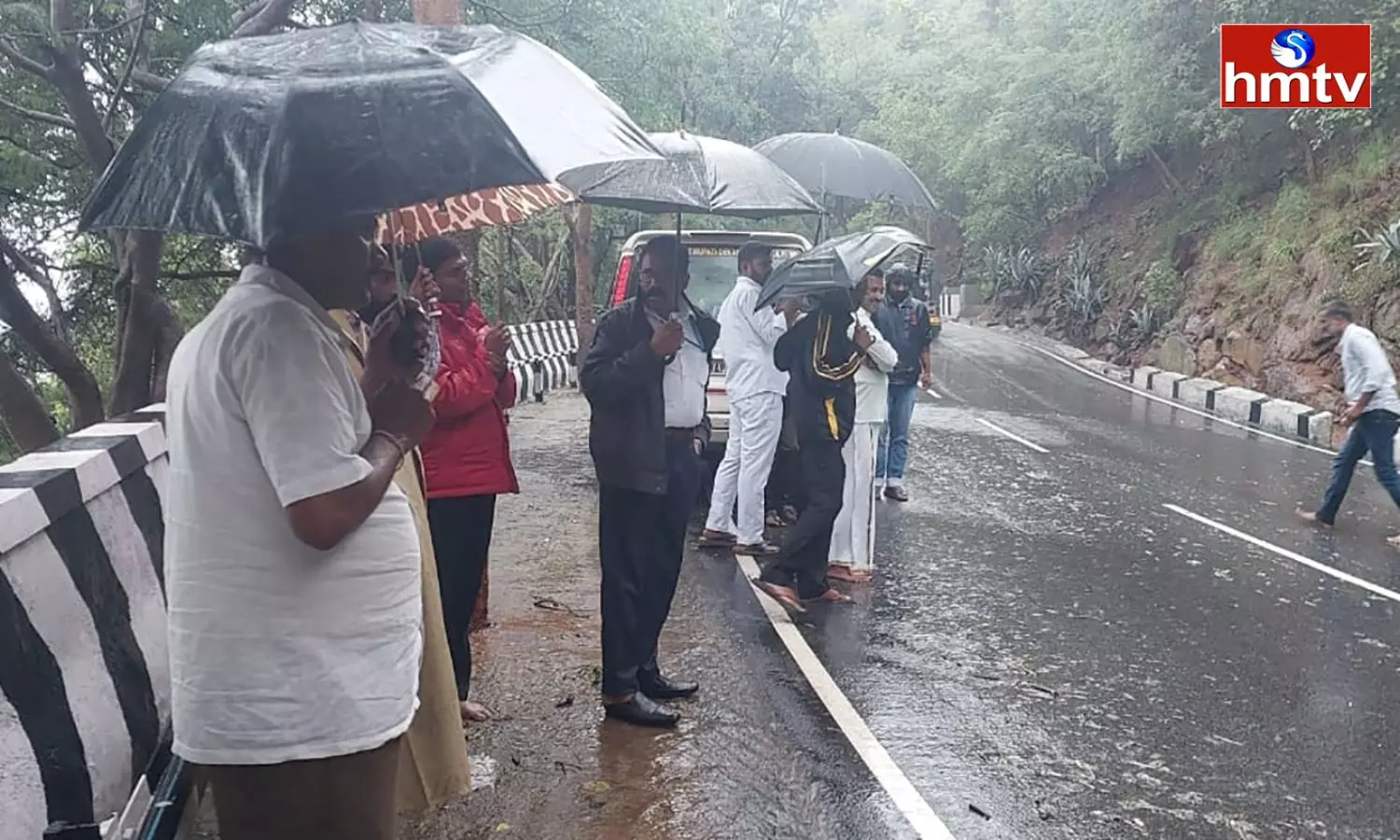 Massive Tree Uprooted Due To Heavy Rain In Tirumala