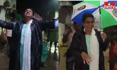 Minister Roja Enjoyed Taking Selfies in the Heavy Rain Minister Roja Enjoyed Taking Selfies in the Heavy Rain