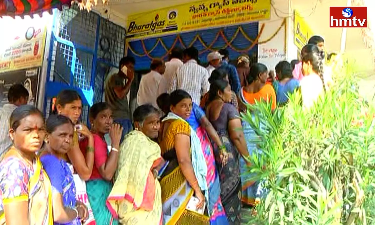 Women Queuing In Front Of Agencies With Aadhaar Card