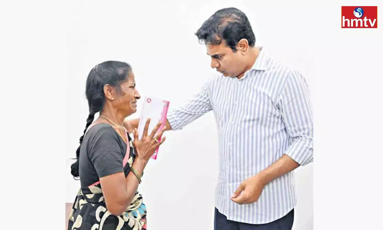 KTR Hands Over Rs 1 Lakh To A Woman For Her Daughter Education KTR Hands Over Rs 1 Lakh To A Woman For Her Daughter Education