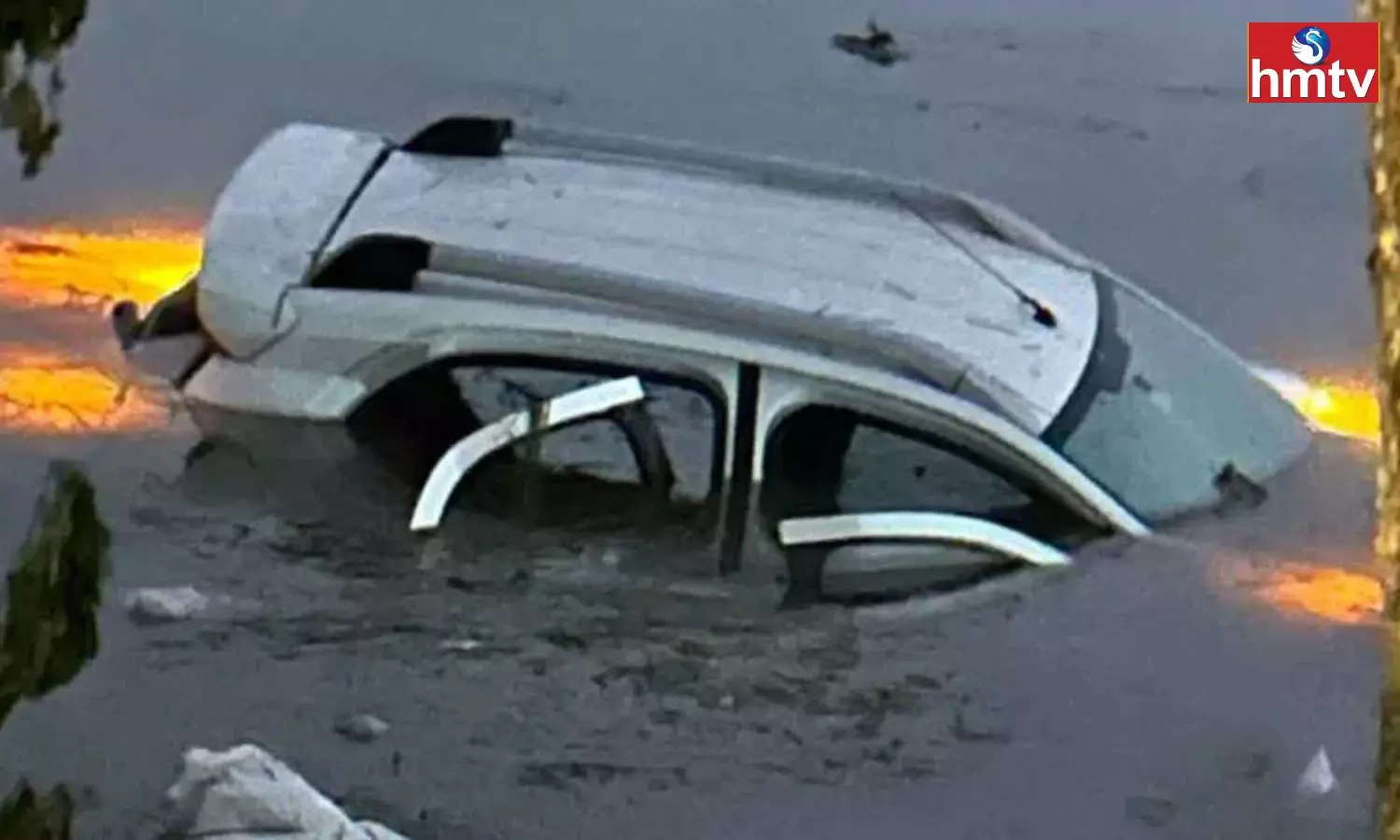 A Car Plunged Into A Pond Due To Snow In Vikarabad A Car Plunged Into A Pond Due To Snow In Vikarabad