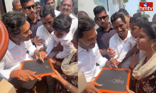CM Jagan Studied Alphabet with a Child CM Jagan Studied Alphabet with a Child