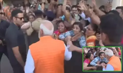 PM Modi Interacting With a Visually Challenged Girl After Casting his Vote in Ahmedabad PM Modi Interacting With a Visually Challenged Girl After Casting his Vote in Ahmedabad