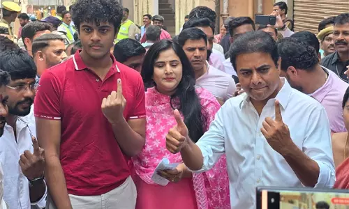 KTR Cast His Vote Along With Family Members In Nandi Nagar KTR Cast His Vote Along With Family Members In Nandi Nagar