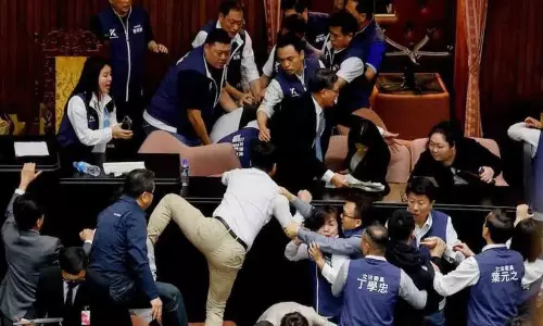 All Out Brawl In Taiwan Parliament Lawmakers Grapple Exchange Blows