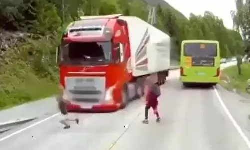 School Kid Just Missed Accident by Truck Video Goes Viral in Social Media