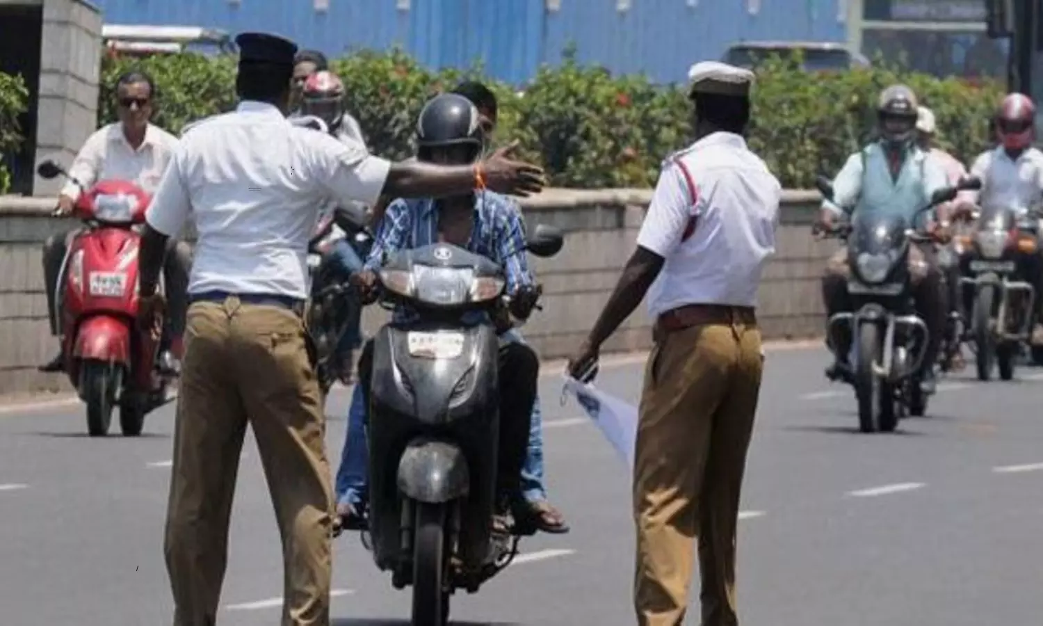 Road Safety  Talking to Pillion Rider While Bike Driving is Punishable in Kerala