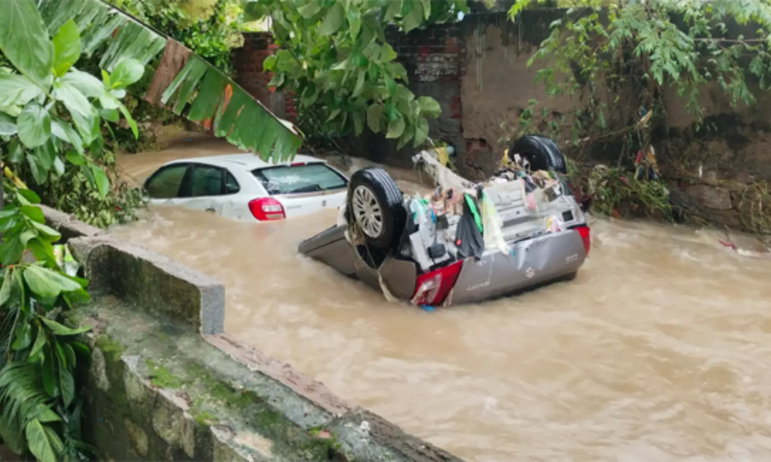 Heavy Rain Fall at Kodada and Vehicles Rashed Away