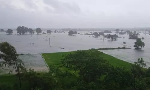 Heavy Rains in Telangana Red Alert to Hyderabad