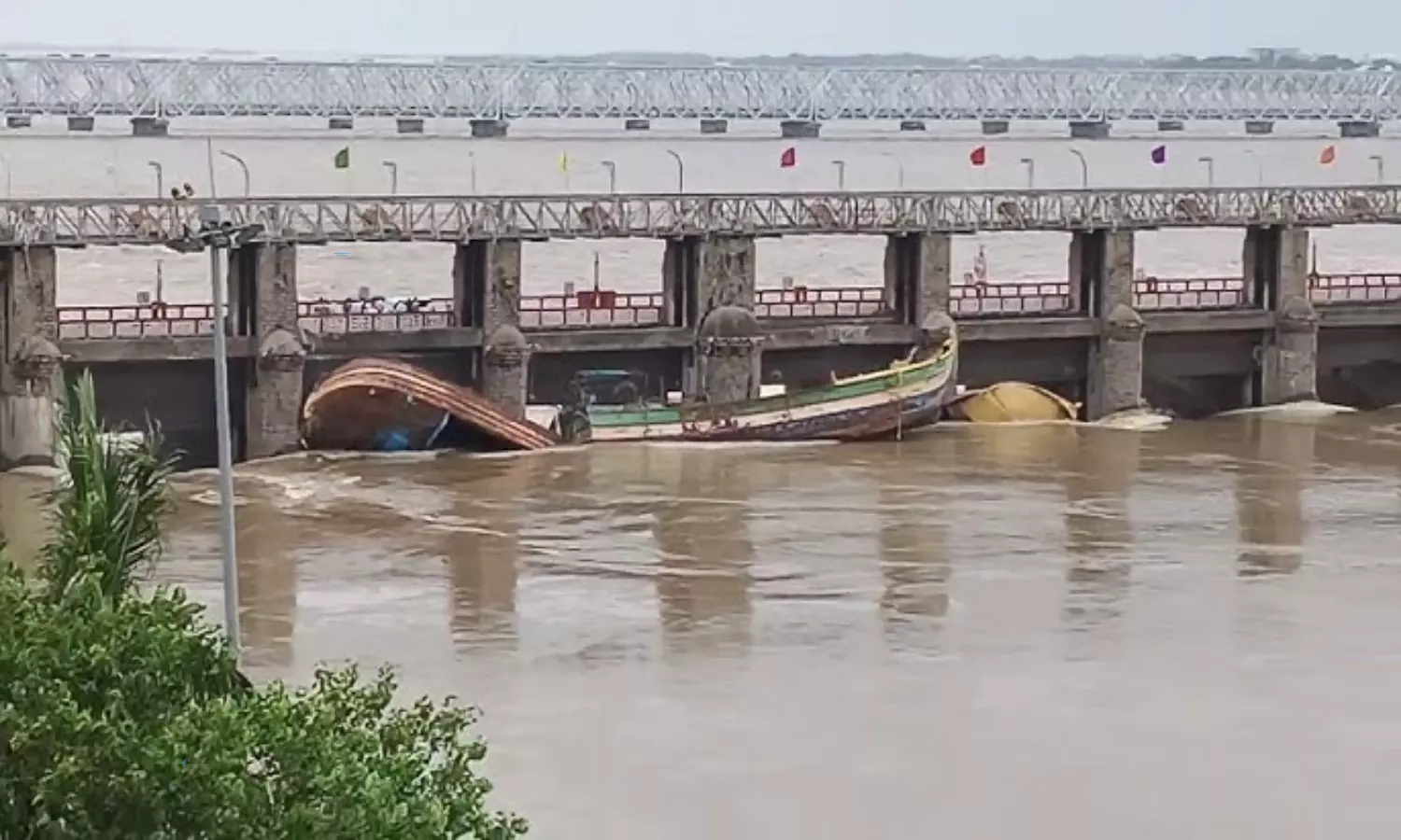 Whose boats hit the gates of Prakasam Barrage? Is there a conspiracy behind this?