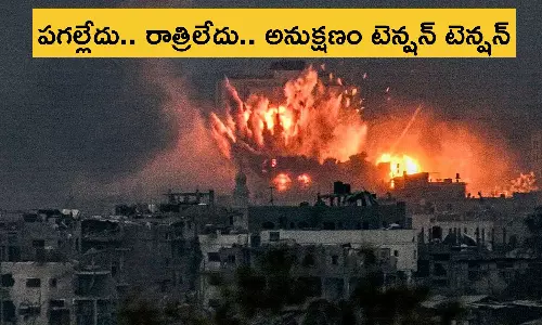 ఇజ్రాయెల్ వైమానిక దాడులతో గాజా రక్తసిక్తం... పెద్దపెద్ద గోతుల్లో తమవారిని వెతుక్కుంటున్న సామాన్య జనం ఇజ్రాయెల్ వైమానిక దాడులతో గాజా రక్తసిక్తం... పెద్దపెద్ద గోతుల్లో తమవారిని వెతుక్కుంటున్న సామాన్య జనం