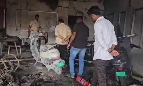 A young man who poured petrol on Ola showroom and set it on fire for not repairing the scooter A young man who poured petrol on Ola showroom and set it on fire for not repairing the scooter