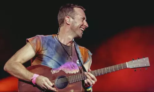 BookMyShow: కోల్డ్‌ప్లే కన్సర్ట్ టికెట్స్ సేల్‌కి ముందే క్రాష్ అయిన బుక్ మై షో... కోల్డ్‌ప్లేకు అంత భారీ డిమాండ్ ఎందుకు?