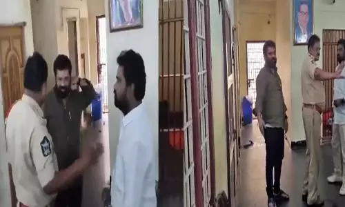 Police Take Nandigam Suresh into Custody Police Take Nandigam Suresh into Custody