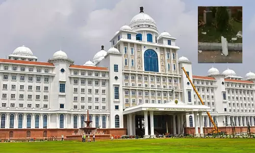 telangana secretariat cement block collapsed from 5th floor on Ramagundam market committee chairman car