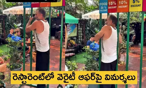 Thailand Restaurant Chiang Mai Breakfast World Offers discount for squeezing through metal grill faces criticism