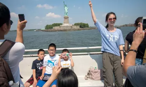 China: అమెరికా వెళ్తే ఈ జాగ్రత్తలు తప్పనిసరి.. తమ టూరిస్టులకు చైనా హెచ్చరిక