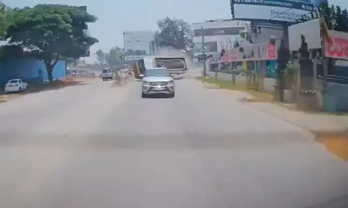 Water Tanker Flips in High-Speed Crash Near Bengaluru Shocking Road Accident Caught on Camera Water Tanker Flips in High-Speed Crash Near Bengaluru Shocking Road Accident Caught on Camera