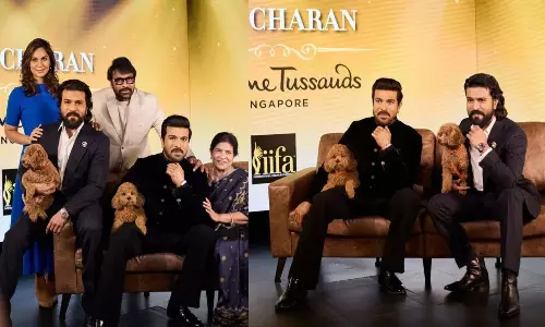 Ram Charan Unveils Wax Statue with Pet Dog Rhyme Ram Charan Unveils Wax Statue with Pet Dog Rhyme