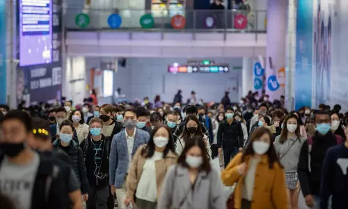 Hong Kong and Singapore report record spike in COVID-19 cases as pandemic rages