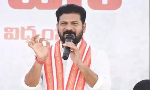CM Revanth Reddy Slams KCR Family Promises Jobs and Project Visits