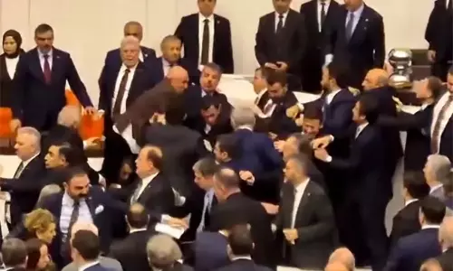 Turkey Parliament: టర్కీ పార్లమెంట్‌లో ఎంపీల ఫైటింగ్.. పిడిగుద్దుల వర్షం!